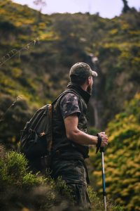 Hunter hiking with a backpack